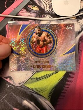 Topps Wrestling Card with Red and Gold Holographic Design - Rick Steiner /175